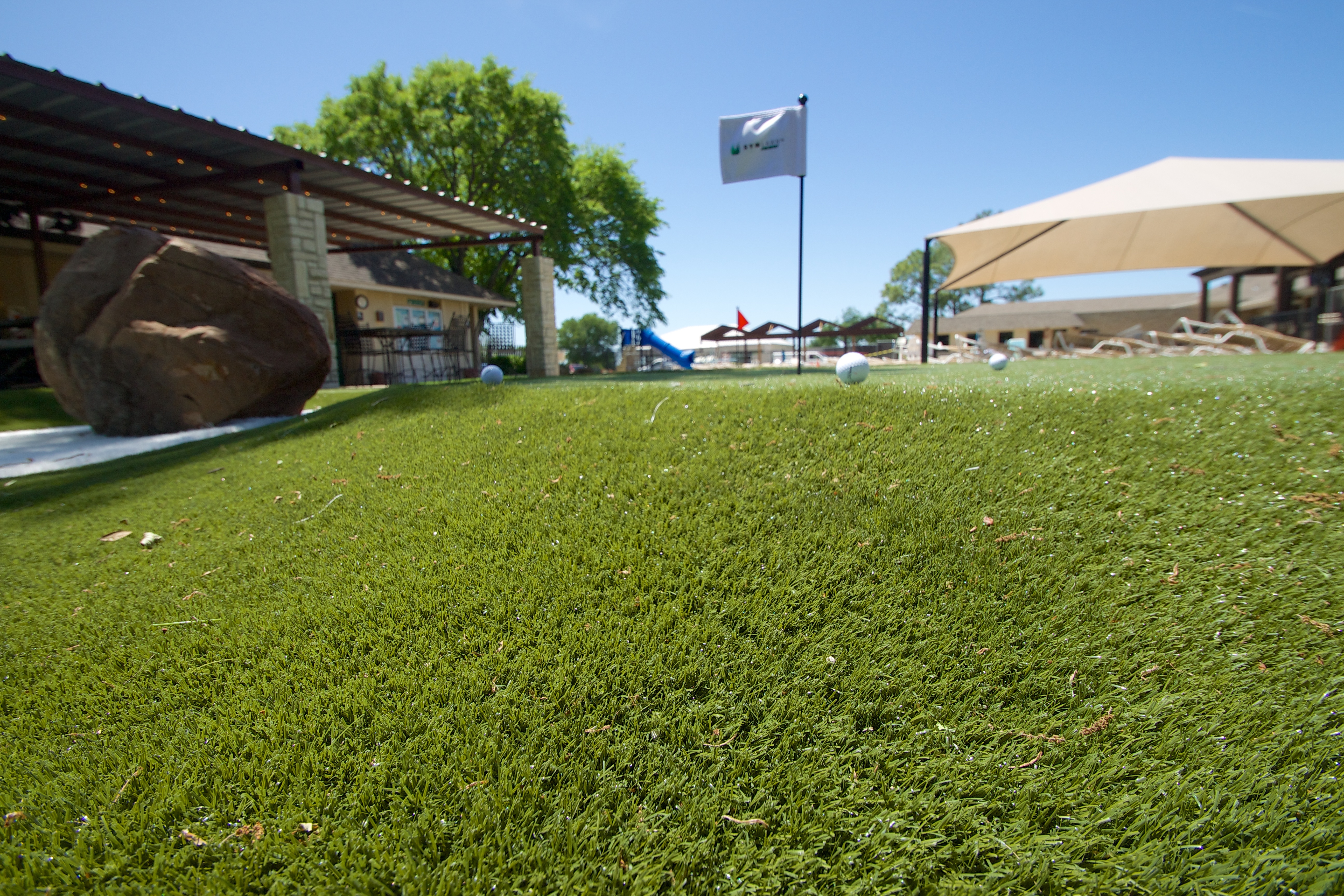 SYNLawn flag on artificial putting green