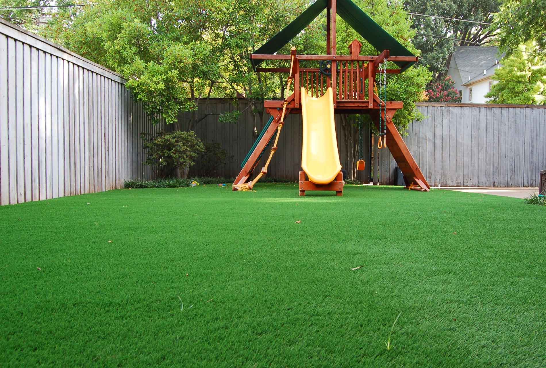 Artificial grass backyard playground