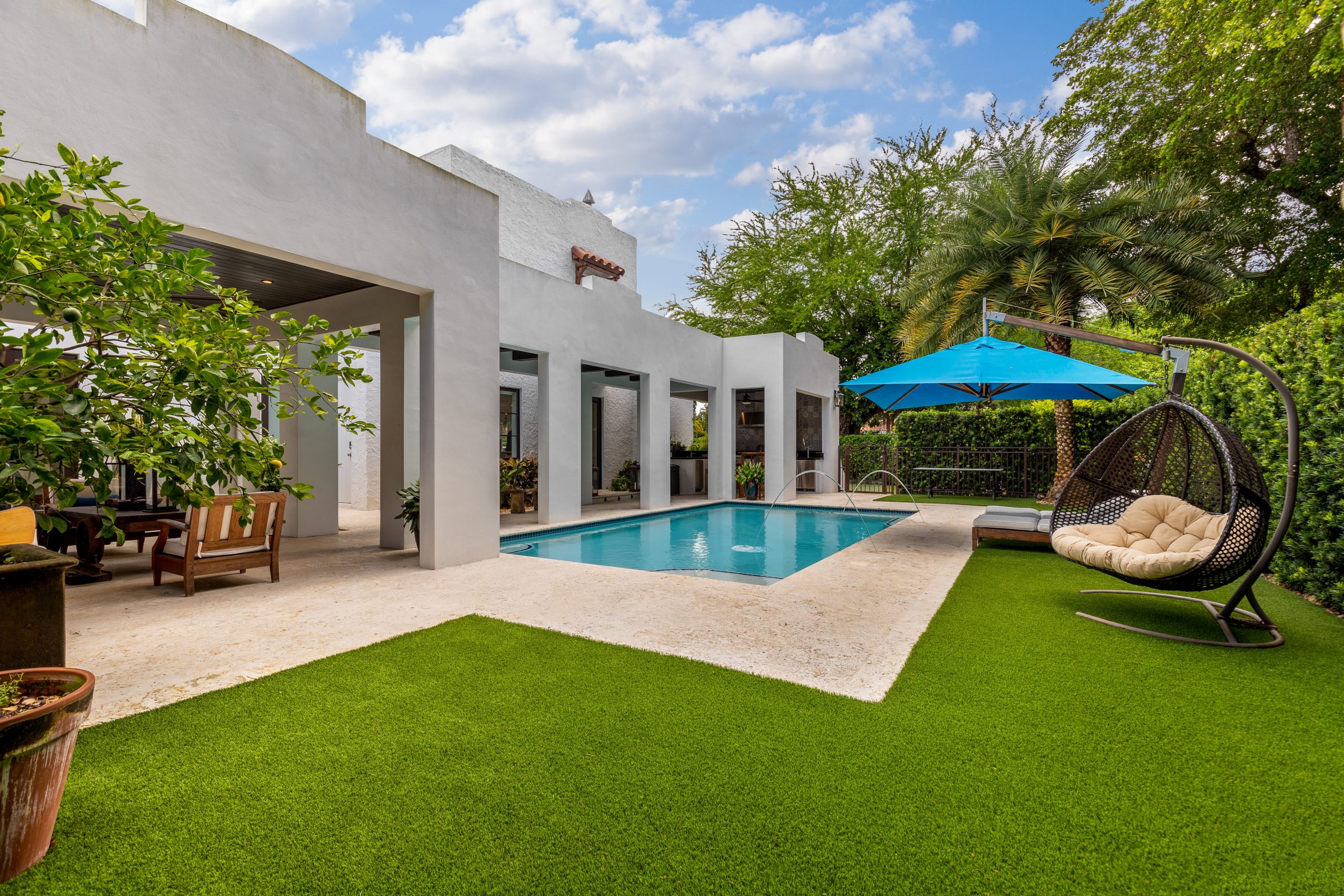 Backyard with pool with Oklahoma Artificial Turf